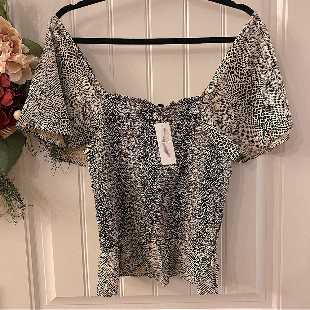 Jessica Simpson Smocked Flutter Sleeve Peplum Top in Gardenia
